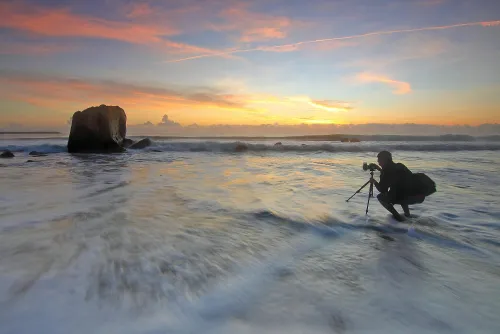 Fotograf bei Sonnenuntergang